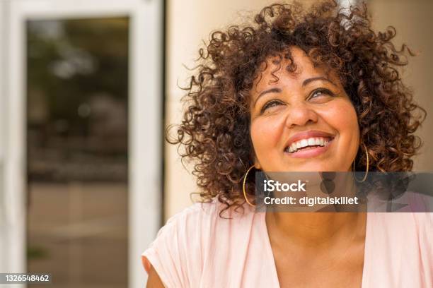 Portrait Of A Mature Woman Laughing Stock Photo - Download Image Now - One Woman Only, Happiness, Mature Women