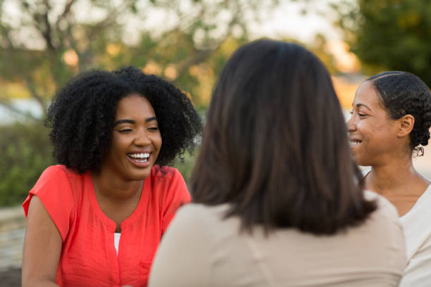 istock Multi-ethnic group of women laughing and talking. 1326548478