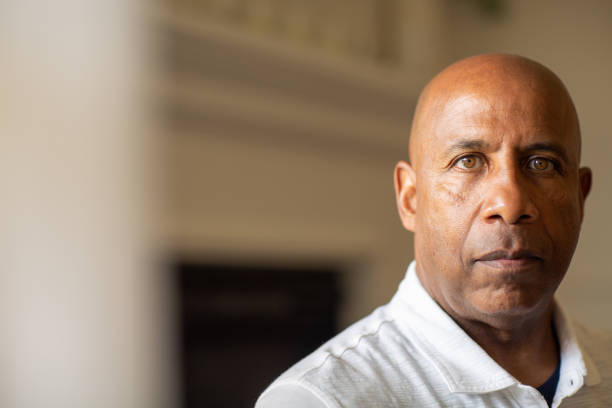 istock Senior African American man looking not smiling and looking depressed. 1326549339