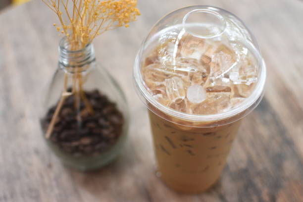istock Iced coffee latte on wood table in coffee shop. 1326550081