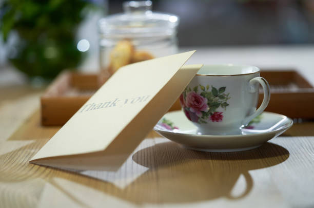 An old-fashioned floral patter tea cup on a table