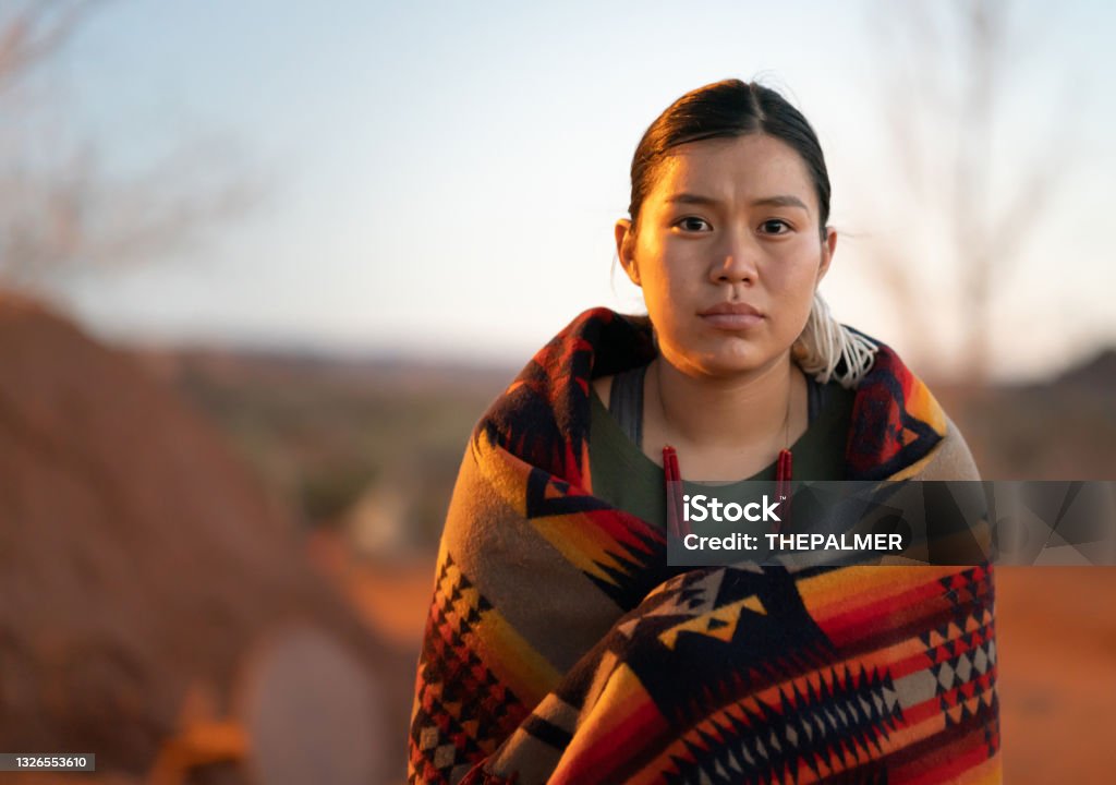 Serious Navajo woman looking at camera Indigenous Peoples of the Americas Stock Photo