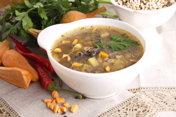 istock Pearl garnish with vegetables in a clay pot 1326557869