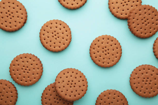 istock Chocolate chip cookie on blue background.Top view. 1326558760