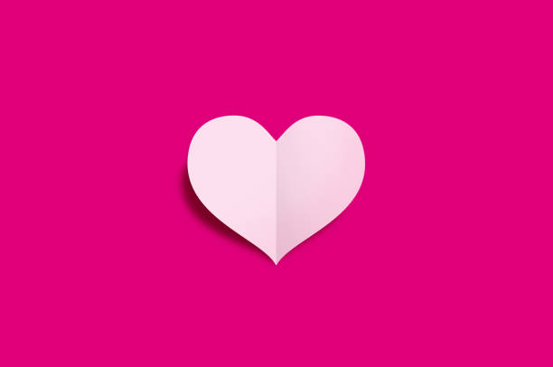 istock white heart form and graphic on color background 1326563765