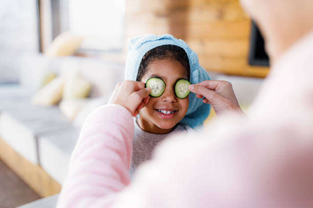 istock Let me put cucumbers on your eyes sweetie! 1326563944