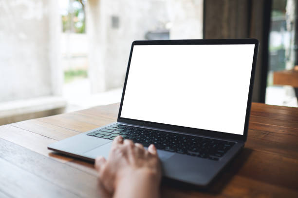 istock a woman using and touching on laptop touchpad with blank white desktop screen 1326566055