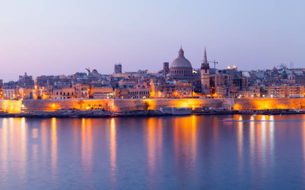 Valletta old town panoramic night view, Malta. Coastal landscape Valletta old town panoramic night view, Malta. Coastal landscape with streets illumination valletta photos stock pictures, royalty-free photos & images