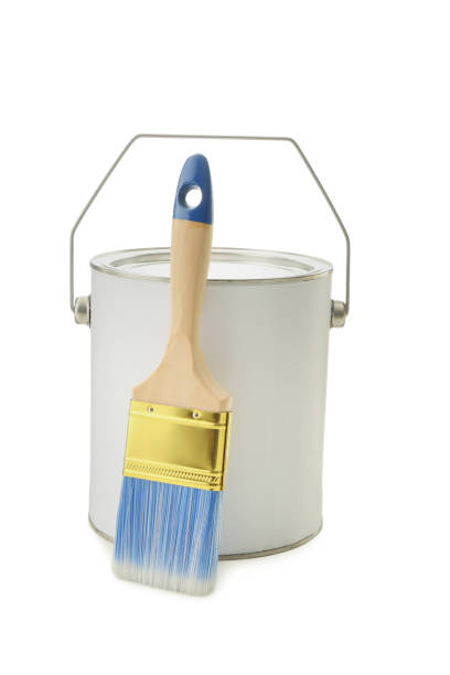 istock Closed blank can of paint and brush isolated on white 1326570686