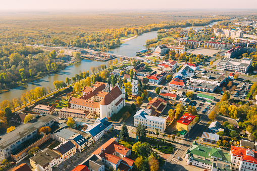 Pinsk, Brest Region, Belarus. Pinsk Cityscape Skyline In Autumn Morning. Bird's-eye View Of Cathedral Of Name Of The Blessed Virgin Mary And Monastery Of The Greyfriars. Famous Historic Landmarks