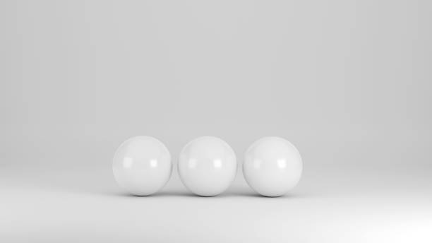 istock Three white spheres on a white background as 3D illustration 1326574389
