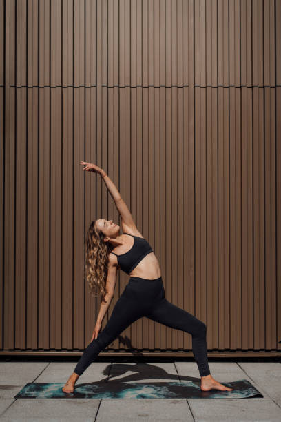 Woman practising Yoga stock photo