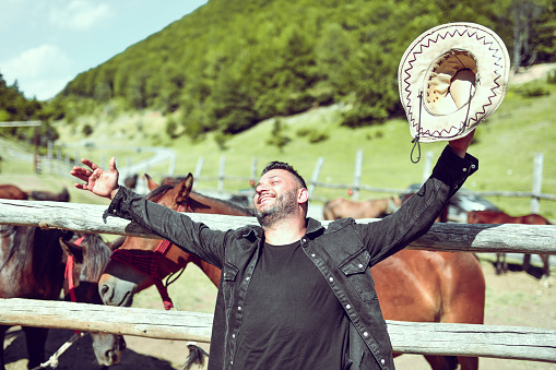 Nature And Freedom For Cowboy Spending Day On Mountain Horse Ranch