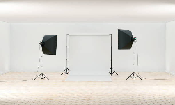 istock 3D Photography studio. Photo studio white blank background with soft box light, camera, tripod and backdrop. Isolated on white background 1326580690