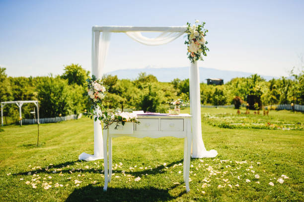 istock Beautiful wedding arch of flowers 1326580832