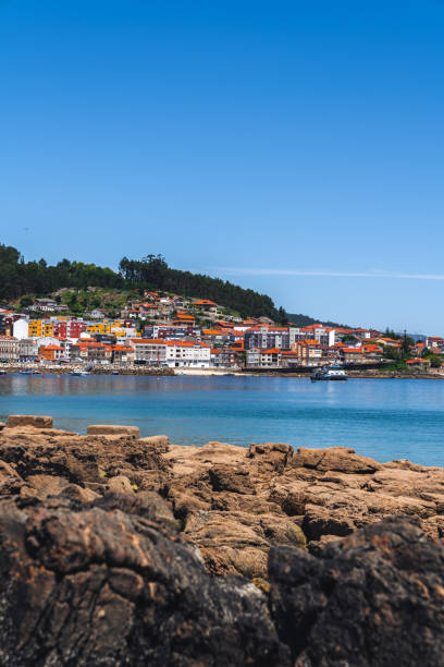istock Coastal village with sea and rocks 1326581844