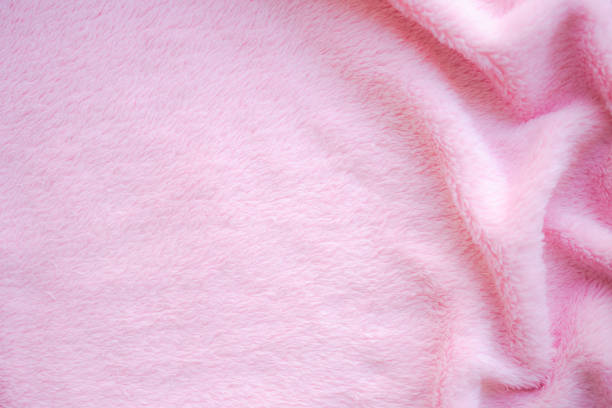istock Pink fabric cotton background. display  abstract texture luxury cloth soft wave. 1326582141