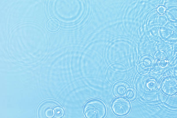 istock transparent blue colored clear calm water surface texture 1326582891