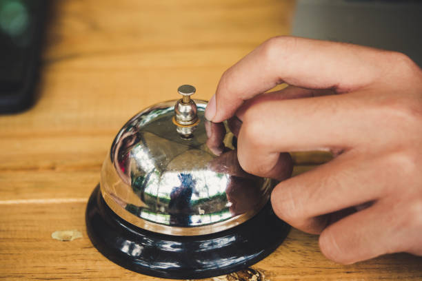 istock Pressing a bell to order food 1326584369