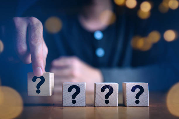 istock Businessman analyzing business service questionare which print screen on wooden cube block, Satisfaction concept.Selection & Choosing emotion or mood concept. 1326606087