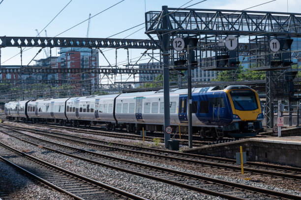 istock Class 195 DMU train departing from Leeds railway station 1326607239