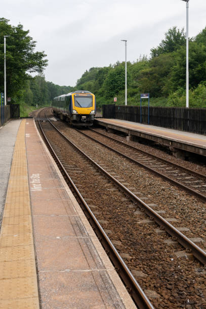 istock Class 195 passenger train to Nottingham passing through Darton railway station 1326607470