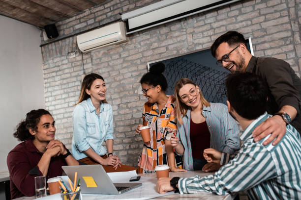 istock Group of young people discussing architectural designs in the creative office. 1326607681