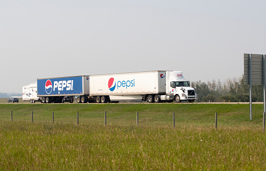 A Pepsi truck hauling freight north on the Queen Elizabeth Highway near Edmonton, Alberta. Taken on August 10, 2018