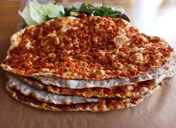 Traditional turkish lahmacun pita with ground beef in Istanbul turkey
