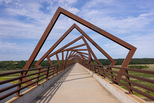 A unique bridge on a bike trail.