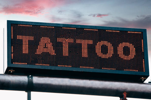 istock Glowing tattoo sign in city 1326615059