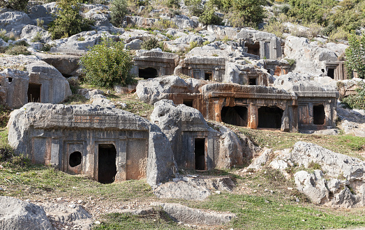 Ruins of rock tombs in the ancient city of Limyra, Antalya, Turkey.