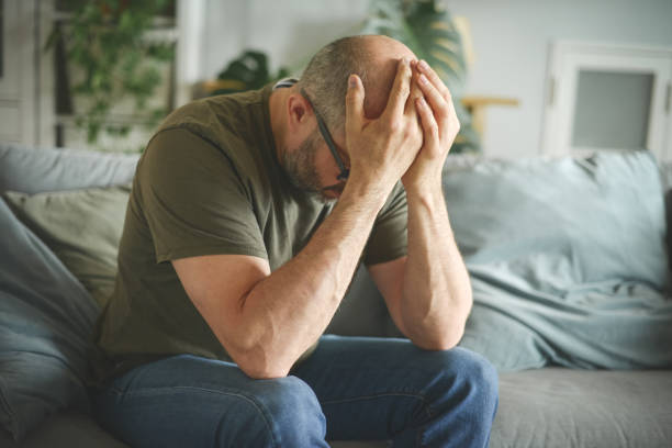 istock mature adult man working from home office ( negative emotion ) 1326616224