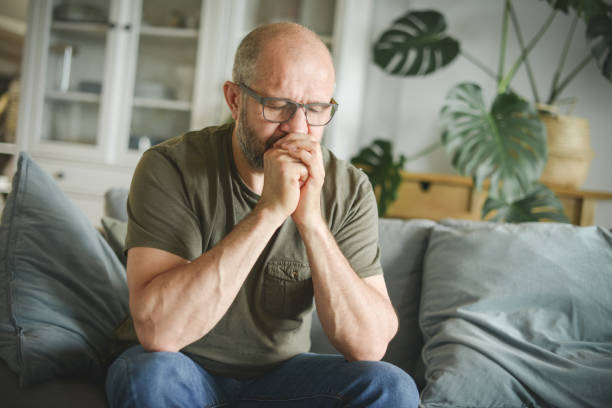 istock mature adult man working from home office ( negative emotion ) 1326616521