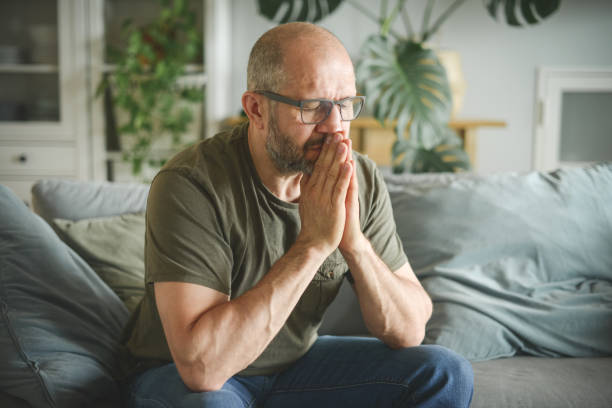 istock mature adult man working from home office ( negative emotion ) 1326616642