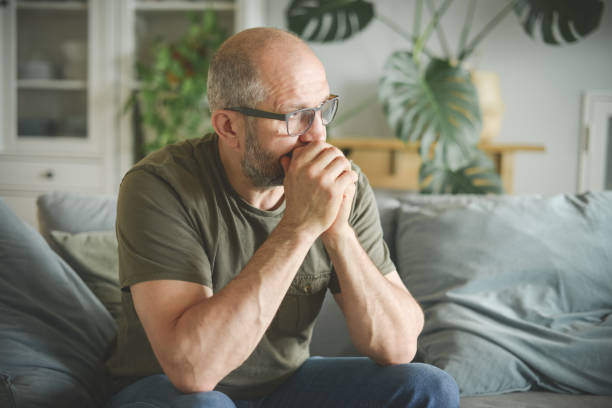 istock mature adult man working from home office ( negative emotion ) 1326616741