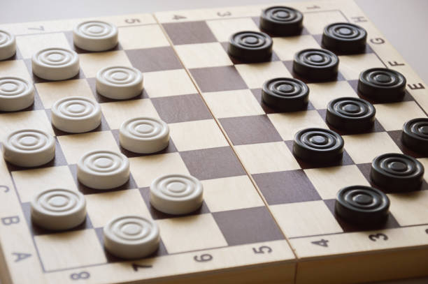 istock checkers. a board game for brains, strategy. black and white figures. 1326617429
