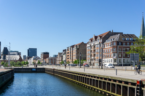 Aarhus, Denmark - 8 June, 2021: view of the harbor front and canals in Aarhus on a beautiful summer day