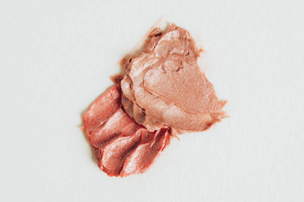 istock A smear of nude lipstick on a light background 1326619944