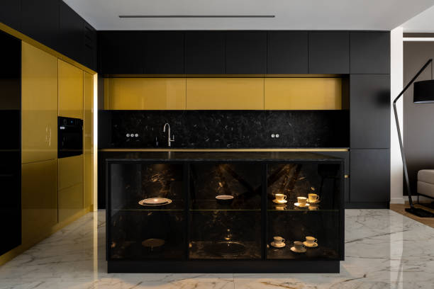 istock Exclusive gold and black kitchen with marble floor 1326620961