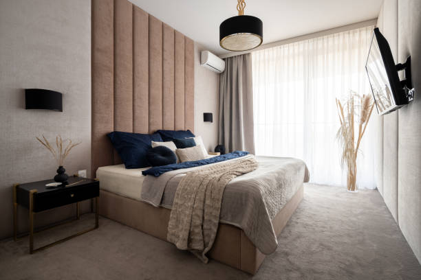istock Elegant and comfortable bedroom with big window 1326620966