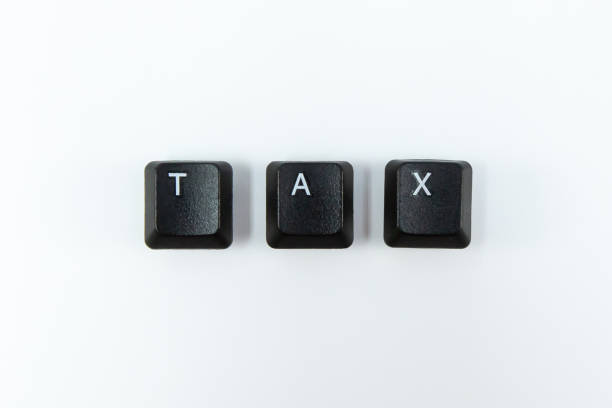 istock Keyboard keys saying tax isolated on white. 1326621176