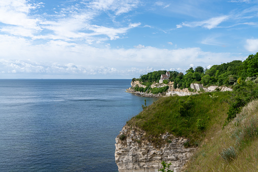 A view of the church at Hojerup on top of the white chalkstone cliffs of Stevns Klint
