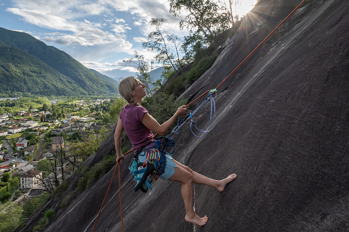 People outdoor activities. Low angle view, she moves down\nTicino canton, Switzerland