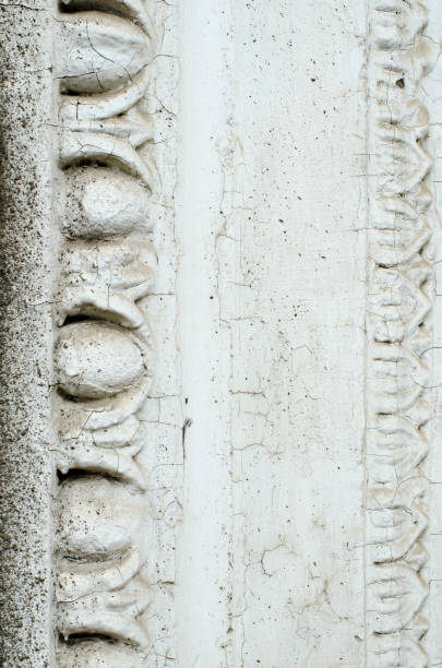 istock A fragment of an old building in classical style. White and grey. Background 1326625291