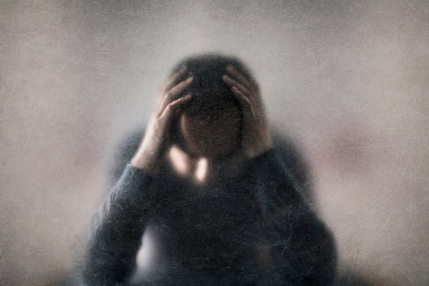 istock Depression. Broken man behind a dusty scratched glass. 1326626648