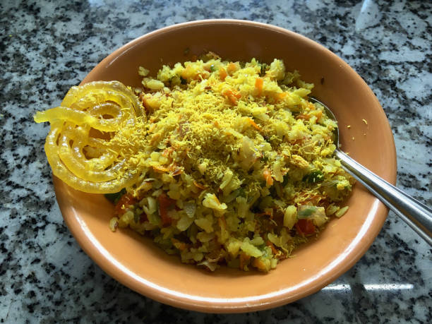 istock Jalebi with Mix vegetable Poha In Plat 1326626772
