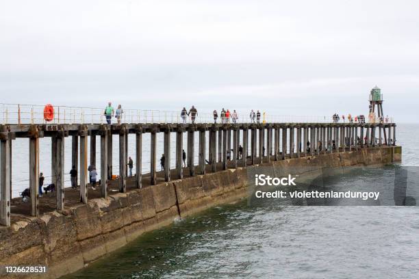 Whitby East Pier North Yorkshire England Stock Photo - Download Image Now - North Yorkshire, Architectural Column, Architecture