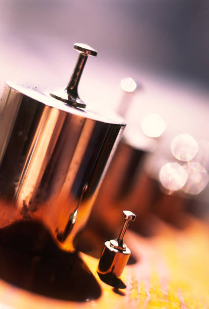 istock Old weights for weighing chemicals on a blurred background indoors. 1326637525