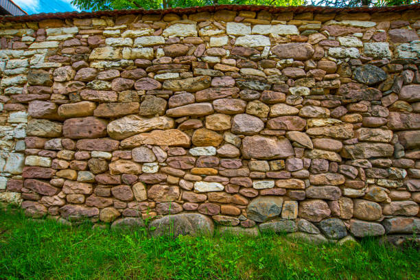 istock Vintage stone wall in the village 1326638134